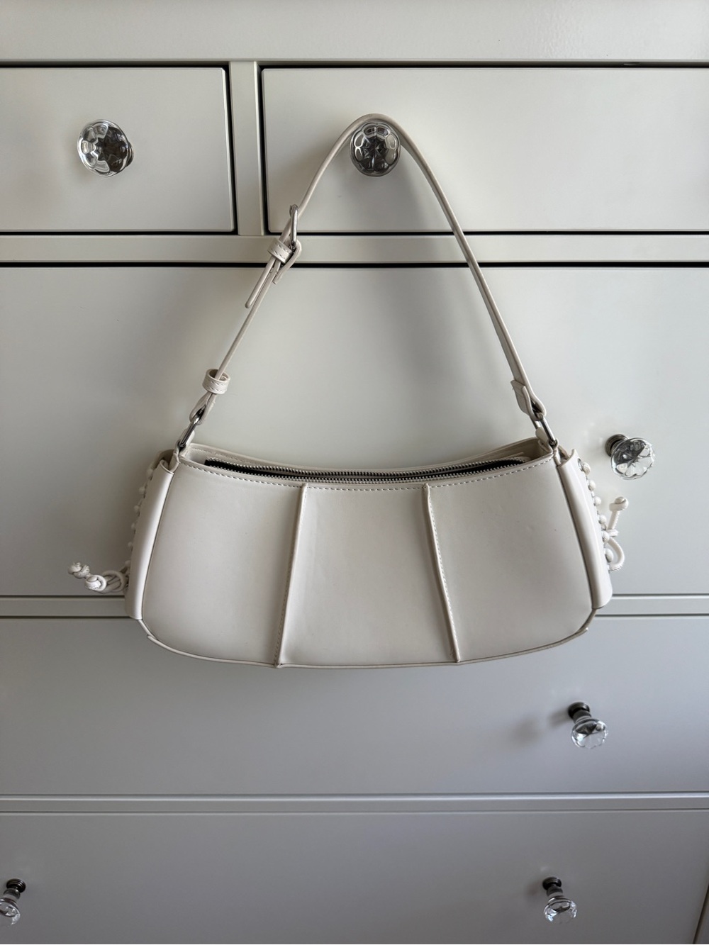BCBG Structured Cream Shoulder Bag with lace up detail and buckle strap